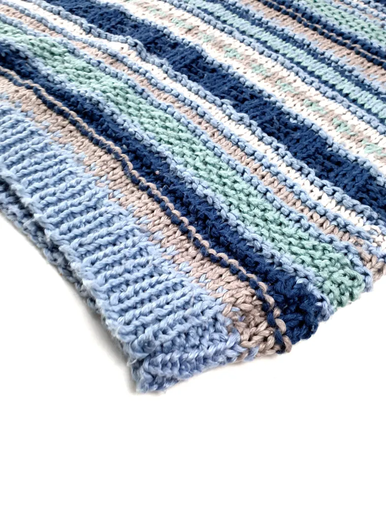 HAND KNITTED SLIPOVER WITH BLUE STRIPED PATTERN